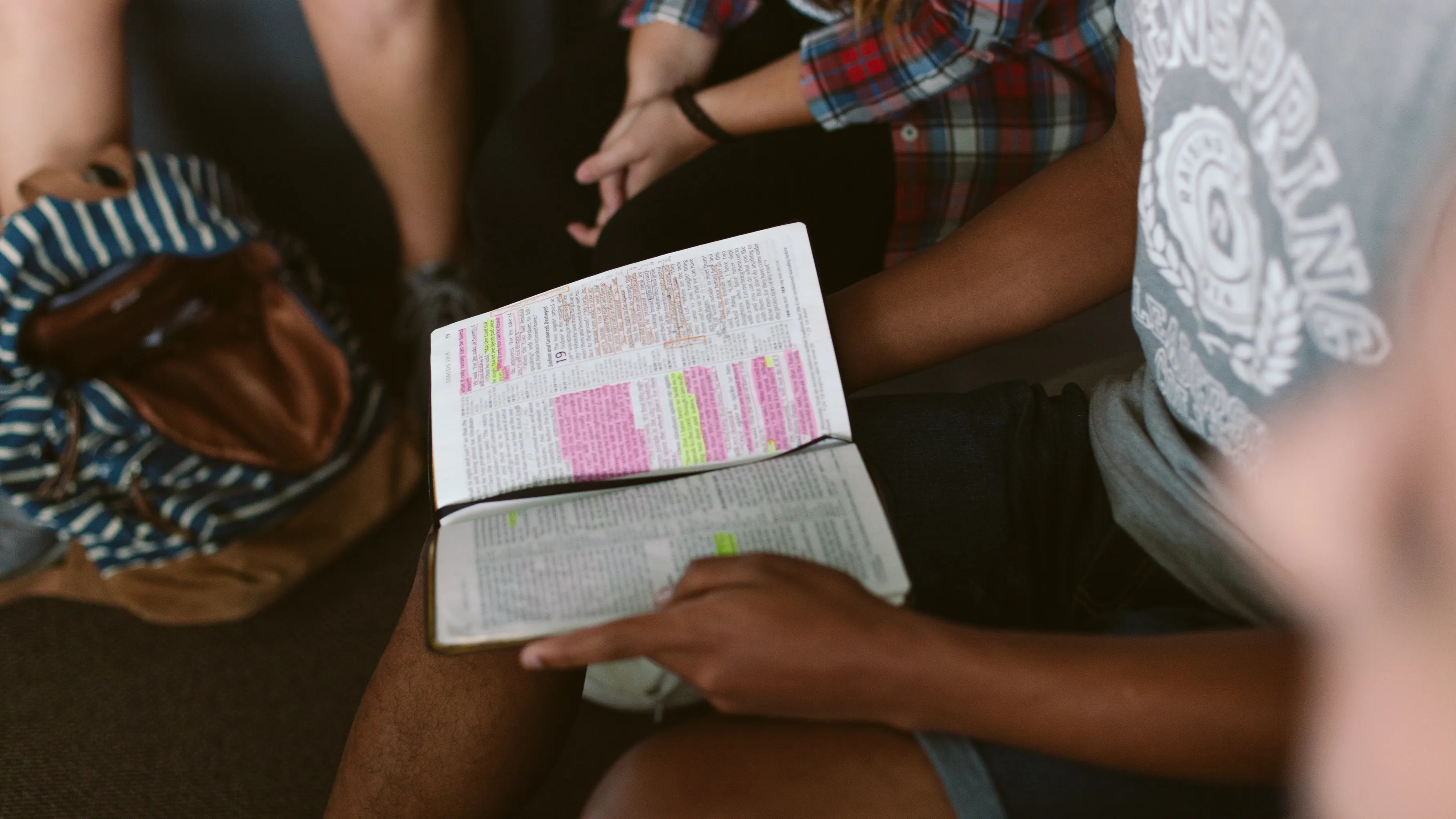 Small group reading the Bible together